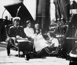 The royal couple of russia, tsar nicholas ll and tsarina alexandra fyodorovna aboard the royal yacht with two of their children.