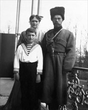 The royal couple of russia, tsar nicholas ll and tsarina alexandra fyodorovna with their son.