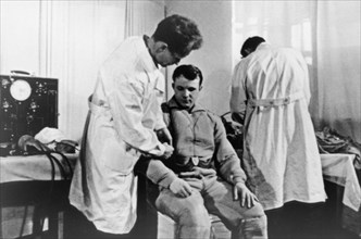Cosmonaut yuri gagarin undergoing a medical exam prior to his space flight, 1961.