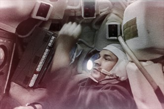 Valery kubasov in the capsule during the soyuz 6 mission, 1970.