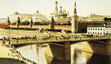 A postcard dating c, 1900 depicting the moskvoretsky bridge and the kremlin in moscow, russia.