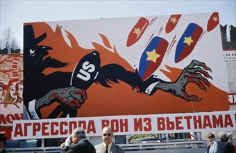 Aggressors out of vietnam!' reads a cold war era billboard on a moscow street showing bombs raining down on uncle sam (usa), may 1, 1968.