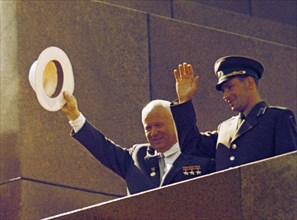 Nikita khrushchev with soviet cosmonaut gherman titov on the rostrum of lenin's tomb in red square, moscow, ussr, august 9, 1961.