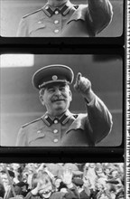 News reel of joseph stalin watching a may day parade in red square, moscow, 1949.