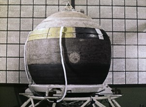 Descent capsule of soviet space probe venera 4 in the last stages of preparation before it's flight, still from a film entitled 'hello venus!'.