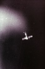 Soyuz 4 in flight seen from soyuz 5, 1969.