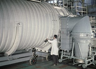 Soviet space probe venera 5 or 6 being tested in a pressure chamber, 1968, this is a still from the film 'the storming of venus', produced by e, kuzis at the tsentrnauchfilm central scientific film st...