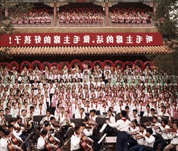 A mass chorus formed by peking (beijing) children singing the revolutionary song 'we are successors to communism' at chingshan park in celebration of  international labor day on may 1st (may day), the...