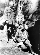 Tito wounded in june 1943 in northern montenegro mountains, seen with dr, ivan ribar (l), later president of the new yugoslavia presidium.
