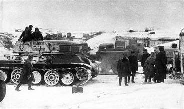 Battle of stalingrad, a soviet t-34 tank unit after it recaptured dubovaya ravine near stalingrad, the tank on the left bears the inscription 'chelyabinsk collective farmers' who paid for the tank fro...