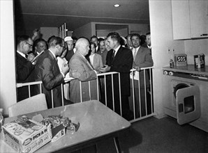 The kitchen debate, vice-president richard nixon and nikita khrushchev during the tour of the american exhibition in sokolniki park in moscow, ussr, 1959, brezhnev is on the far right.