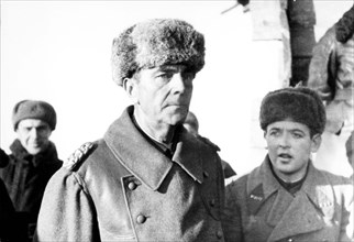 Nazi general field-marshal von paulus taken prisoner after he surrendered at the end of the battle of stalingrad on february 2, 1943, is escorted by soviet interpreter l, bezymensky across the village...