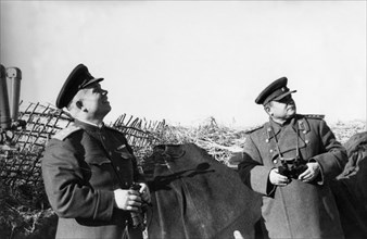 Lt, general nikita khrushchev (left) and general nikolai f, vatutin at a command post on the voronezh front, 1943, world war 2, kursk bulge battle.