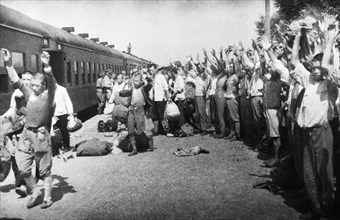 Operation august storm (battle of manchuria), japanese prisoners of war at tungliao railroad station, manchuria, august 1945, japanese surrender to red army, world war 2.