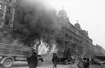 World war 2, a city block of budapest occupied by soviet forces, the buildings were set on fire by the retreating germans, february 1945.