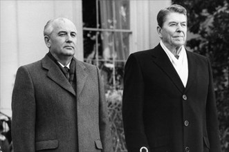 Mkhail gorbachev and ronald reagan outside of the white house prior to their talks on december 8,1987.
