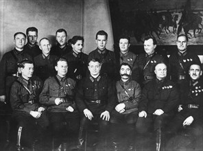 Top soviet miltary commanders, seated, right to left: v, bluecher, a, yegorov, s, budyonny, m,n, tukhachevsky, a, kork with other red army delegates to 17th party congress, moscow, ussr, 1934.