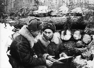 Battle of moscow, 1941, major alexander chapayev (right), the commander of an artillery battalion, and the battalion's comissar n, shakhov at the command post outside the town of yukhnov in the kaluga...