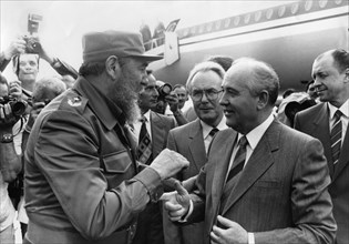 Fidel castro, head of the communist party of cuba (left) meets mikhail gorbachev, general secretary of the cpsu, havana airport, havana, cuba, april 1989.