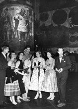 Sixth world festival of youth and students in moscow, july 1957, a group of american youth at a ball in the uspensky cathedral in the kremlin in honor of the festival.