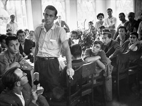 Sixth world festival of youth and students in moscow, july 1957, the international meeting of youth from hungary and the usa - roy e, bullon takes the floor.