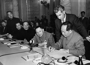 Mao zedong and deng xiaoping during the signing of the declaration with representatives of the communist and workers' parties of the socialist countries, moscow, ussr.