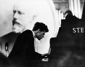 American pianist van cliburn performing a tchaikovsky concerto during the third round of the tchaikovsky international violin and piano competition, from which he walked away with the first prize, apr...