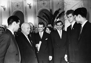 Nikita khrushchev hosting a reception for the participants of the tchaikovsky international violin and piano competition in the kremlin in moscow, april 14, 1958, american pianist van cliburn, second ...