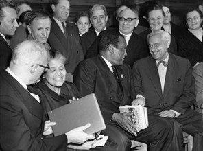 Laureate of the international lenin peace prize 'for strengthening peace among the peoples' paul robeson with his wife eslanda among teachers of the moscow order of lenin state tchaikovsky conservatoi...