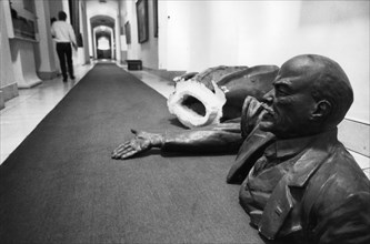 Broken pieces of a statue of v,i, lenin lying in a corridor of the former lenin museum in moscow, russia, february 1994, fall of communism.