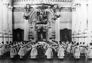 A ballroom dance class at the smolny institute for noble maidens, russia's first women's educational institution, st, petersburg, russia, late 19th century.