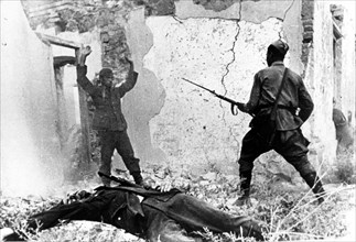 A soviet soldier takes pow a nazi serviceman near the town of mozdok, north ossetia in september 1942.