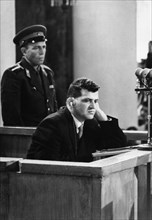 U2 spy plane pilot francis gary powers sits in the dock listening to a translation of the proceedings at his trial in august 1960, moscow, ussr.