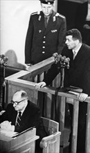 U2 spy plane pilot francis gary powers (right) in the dock at his trial in moscow, august 1960, powers' state appointed defense attorney m,i, grinyev is seated in front of him.