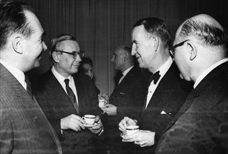 Us ambassador llewellyn thompson with (left to right) nikolai blokhin, president of the soviet-american relations institute and ussr deputy foreign minister, l, sobolev at the friendship house in mosc...