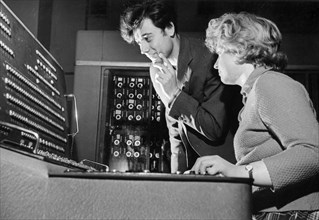 Engineers v, chibisov and m, skripkina at work on the besm-2 computer at the calculating center of moscow's ussr academy of sciences, 1962, these machines are used to solve problems in diverse fields ...