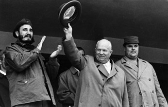 Fidel castro and nikita khrushchev responding to the cheers of the crowd at the opening of the summer sports season at the v,i, lenin central stadium in moscow, april 1963.