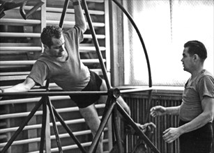 Soviet cosmonauts gherman titov and andrian nikolayev during physical training for there respective vostok 2 and vostok 3 missions in 1962.