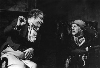 A scene from 'dead souls' adapted from gogol's story, v,v, belokurov as chichikov (left) and b, petker as plushkin, moscow art theatre production, 1965.