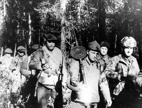 Soviet guerillas on march during world war ll.