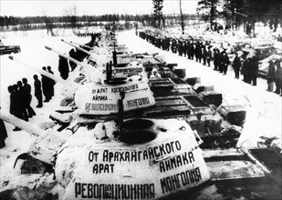 World war 2, soldiers of the 112th tank brigade receiving t-34 tanks made with money collected by the working people of the mongolian people's republic, 1943.