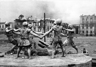 Famous statue on the railroad terminal square of stalingrad after a fasicist air-raid.
