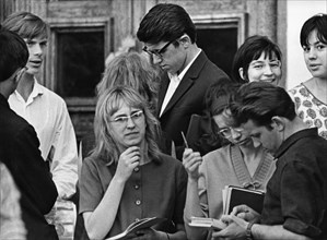Young russian students outside the exam hall before the moscow state university entrance exams, moscow, ussr, 1968.