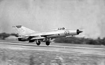 Ussr, october 1968, supersonic fighter jet mig-21 taking off.