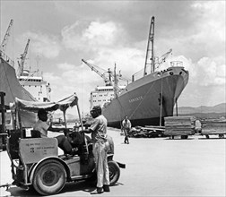 The soviet freighter 'kimovsk' being unloaded in the port of santiago-de cuba, july 1969.