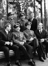 The crews of the soyuz 6, soyuz 7 and soyuz 8 missions in the forest of star town, september 1969, first row (l to r): valery kubasov, georgi shonin, vladimir shatalov, and alexei yeliseyev, 2nd row: ...