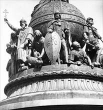 Novgorod, monument comemmorating the thousandth anniversary of russia, designed by m, mikeshin in 1862, alexander nevsky is in the center, holding the shield.