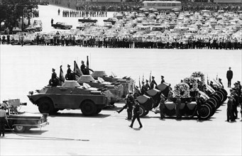 A funeral procession with urns containing the remains of soviet cosmonauts commander georgi dobrovolsky, vladislav volkov, and viktor patsayev on the way to red square, they died during the soyuz 11 m...