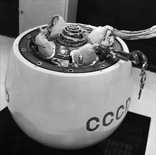 The landing capsule of the soviet space probe, venera 7 on display at the cosmos pavilion at the exhibition of national economic achievements (vdnkh) in moscow, 1970, note the bas-relief emblem with t...