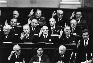 Voting at a cpsu meeting in august 1981, brezhnev (front row, right), gorbachev (middle row, left), and andropov (back row between ustinov and gromyko).